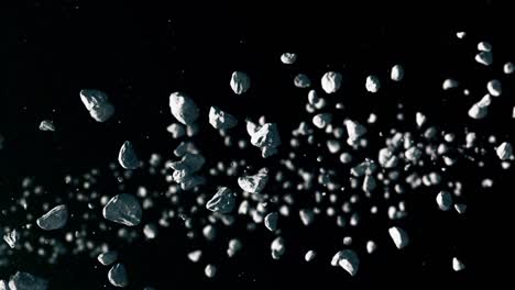 stream of asteroids moving diagonally across dark space with starry background. sci-fi, astronomy, asteroid belt, cosmic debris animation