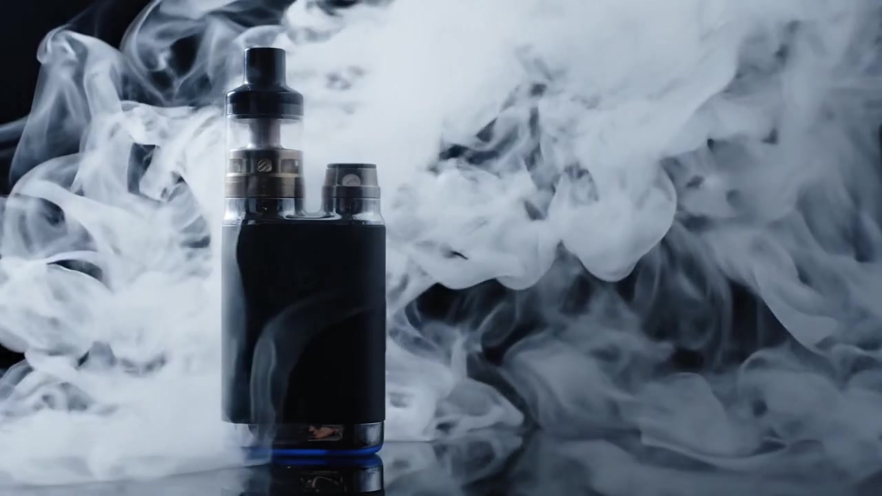 A striking contrast between a vaping device and swirling vapor, highlighting the unique experience of vaporization in a dramatic, smoky atmosphere.
