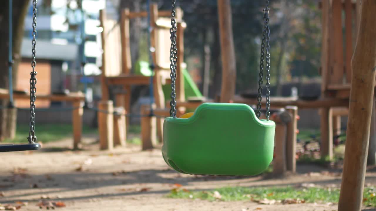 Empty Playground Swings