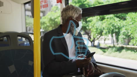 man wearing mask holding phone on bus with thumbs-up animation overlay