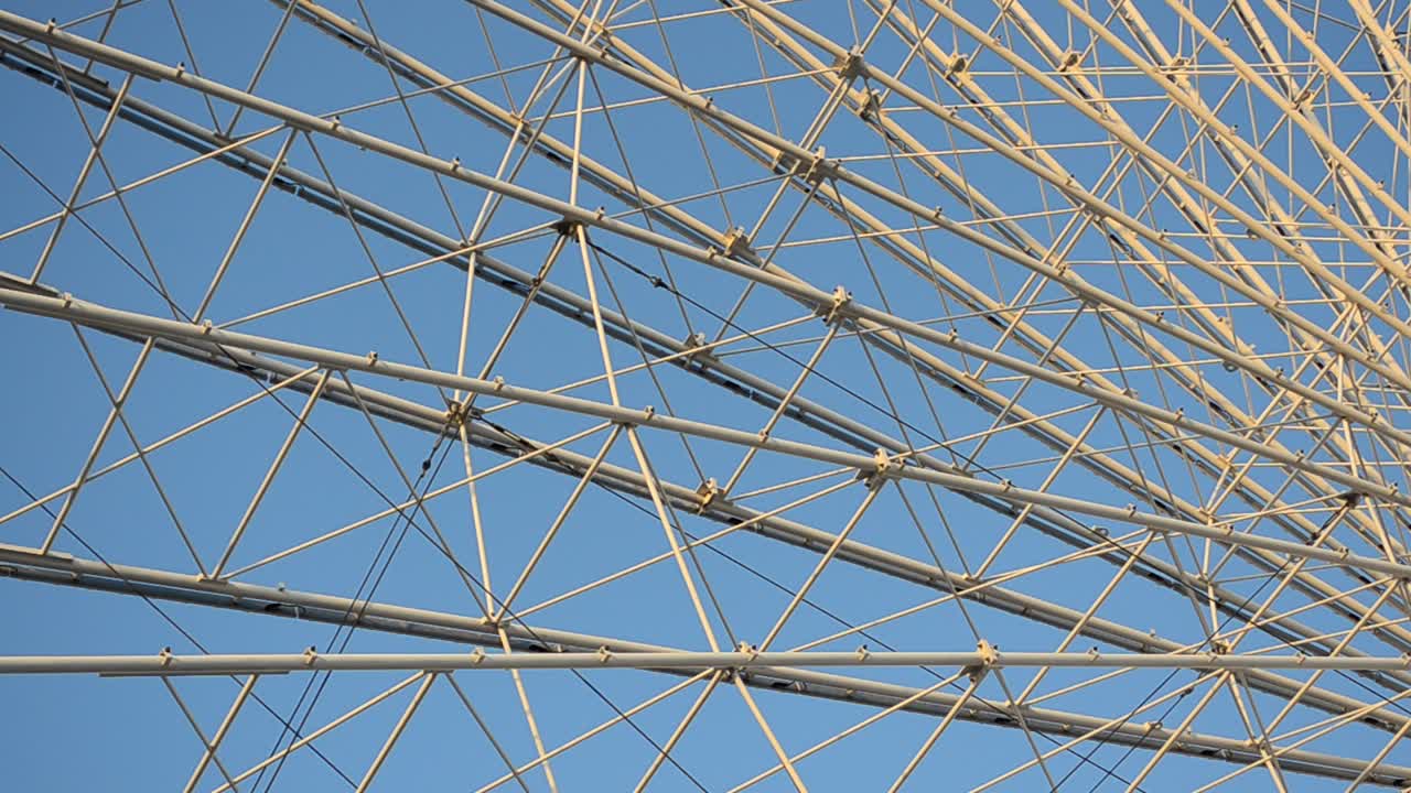 Big wheel against the sky. Shooting in the evening