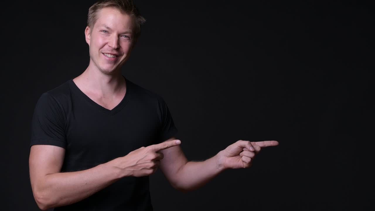 Happy Man Showing Copy Space With Hands