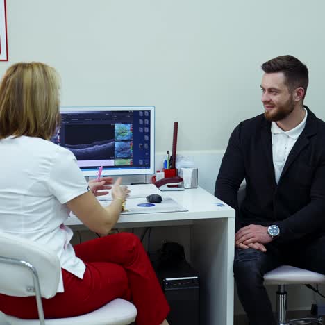 ophthalmologist talking about treatment