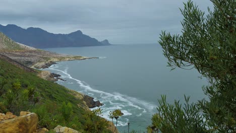 Panning-shot-of-beautiful-rocky-shoreline-from-high-vantage-point,-South-Africa