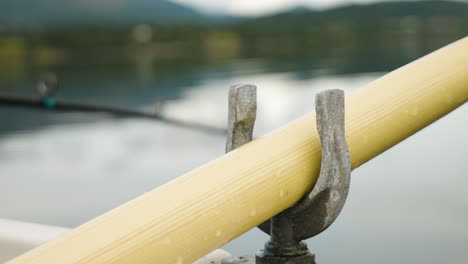 row-while-fishing-in-the-background