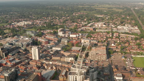 Pan-up-aerial-shot-from-Maidenhead-town-towards-the-smog-of-London