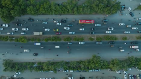 drone bird's eye view over the shahrah-e-faisal karachi road in karachi