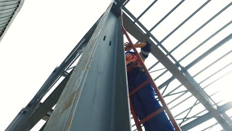 construction site in metal framework grider with crane and workers