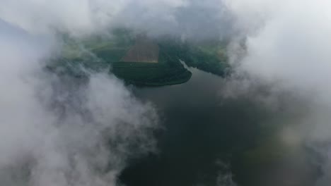 flying through the cloud. aerial view of view of blue sky and white clouds