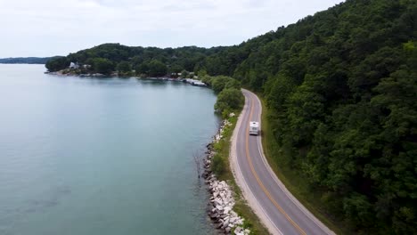 Turning-view-of-a-rustic-shoreline-via-drone