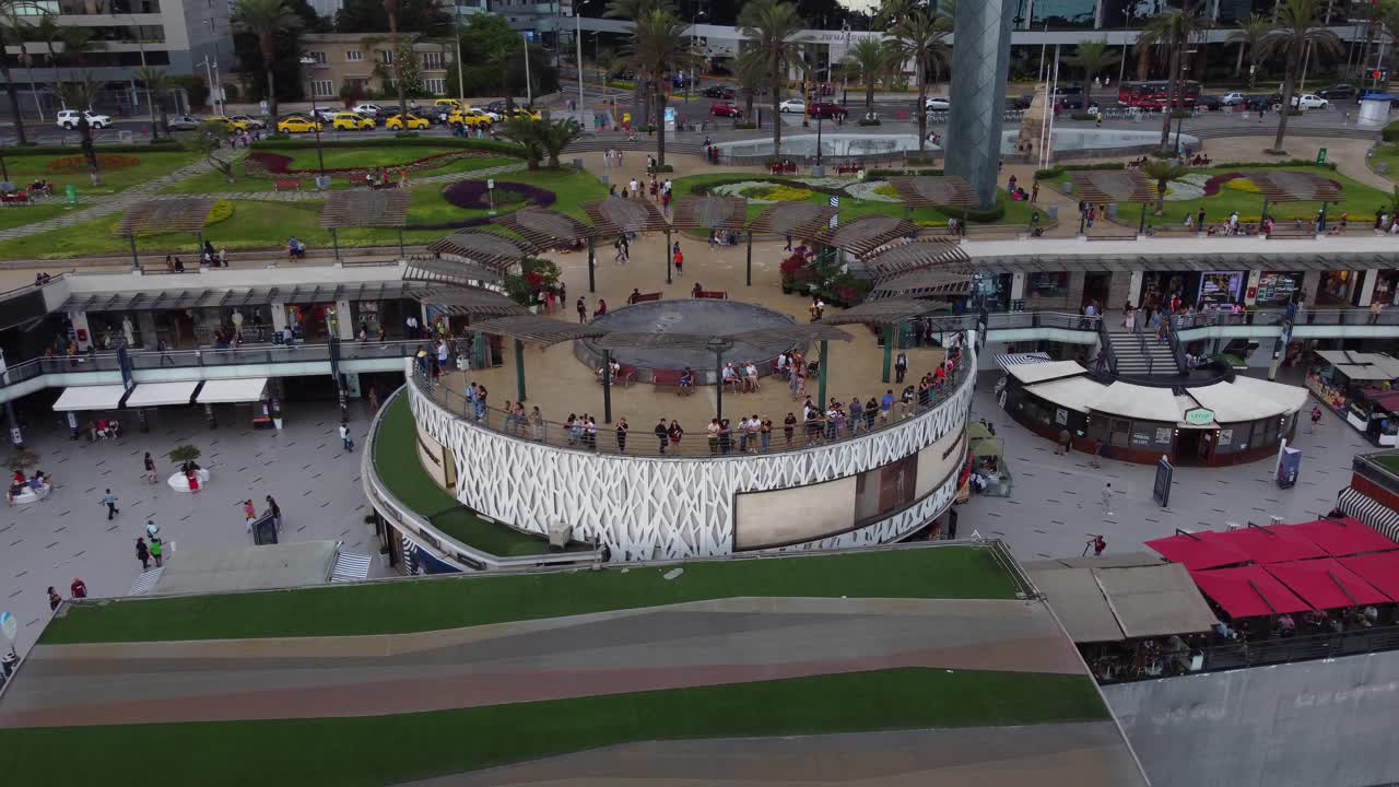 Drone orbiting around around structure in middle of a shopping mall called "Larcomar" Located in Miraflores district of Lima, Peru.