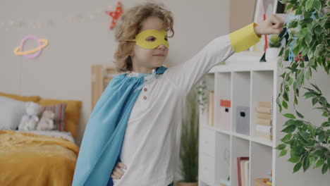 child dressed as superhero