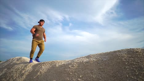 man running on a hill