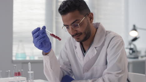 scientist examining samples in a laboratory