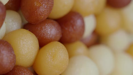 close-up of colorful gulab jamun