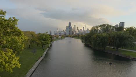 low aerial flight over lake in lincoln park, chicago