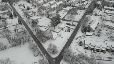 flying over a snowy small town