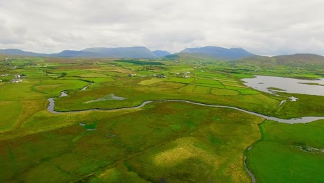 aerial of green farmland 4k