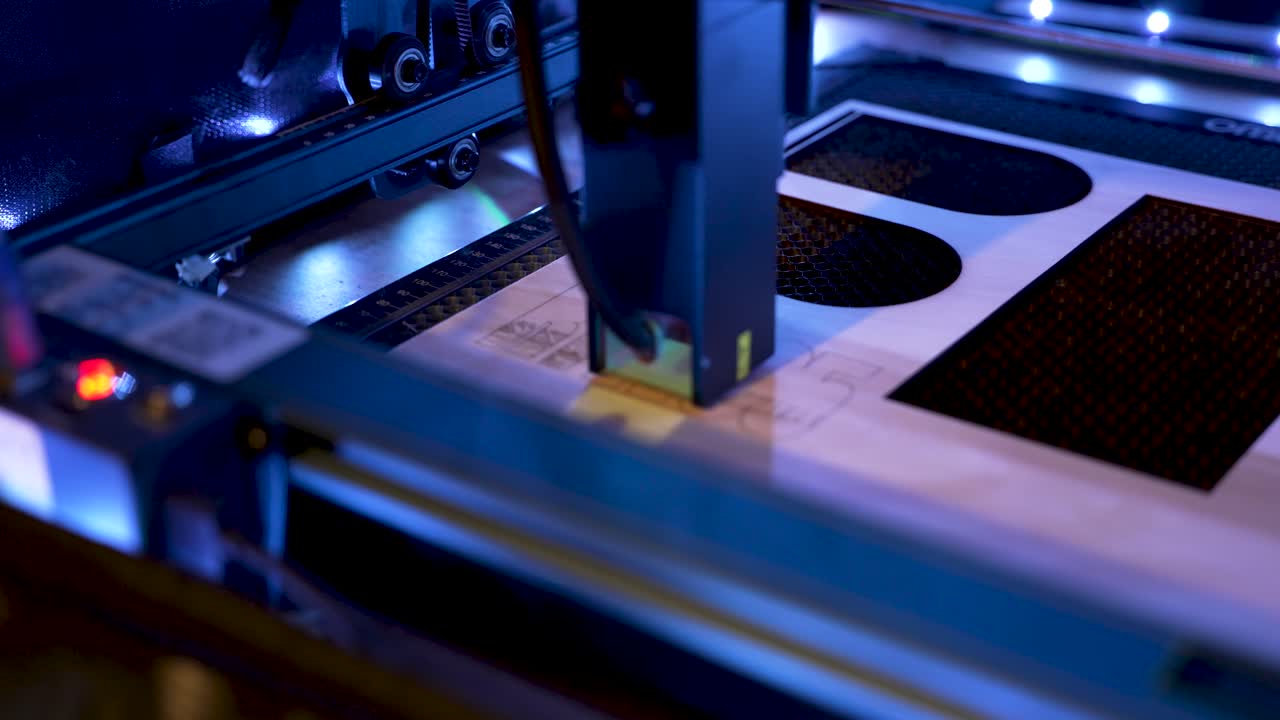 Detailed close-up of a laser engraver cutting wood, highlighting precision, technology, and industrial craftsmanship
