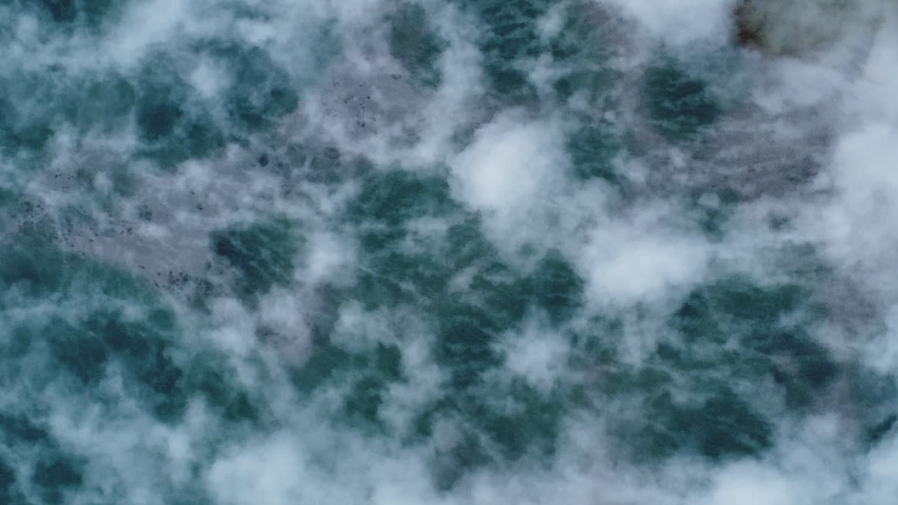Hot Smoke From Thermal Lake In Kuirau Park, Rotorua, New Zealand - aerial top down