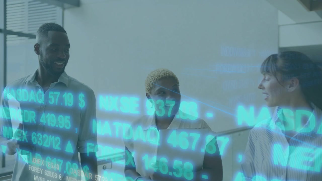 Three coworkers walking corridor, ticker appearing overlaying frame while discussing business data