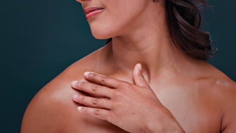 woman touching her chest