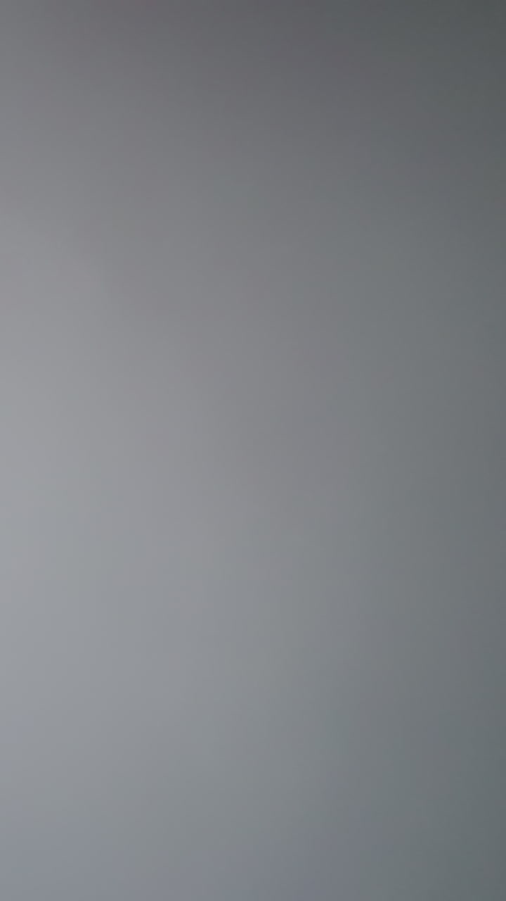 Hot steam clouds as abstract background. Water vapor flows in washroom during hygienic procedures closeup. Wet fume spread slowly in washroom