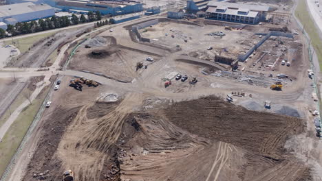 aerial flyover of a large construction building site off the highway in chattanooga, tennessee.