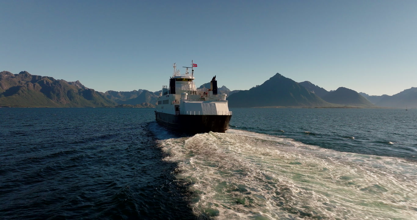 Ferry in Lofoten Islands travel between Fiskebol and Melbu, rear aerial tracking