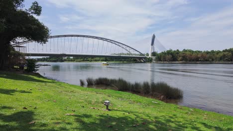 wide angle handheld shot of putrajaya river at day