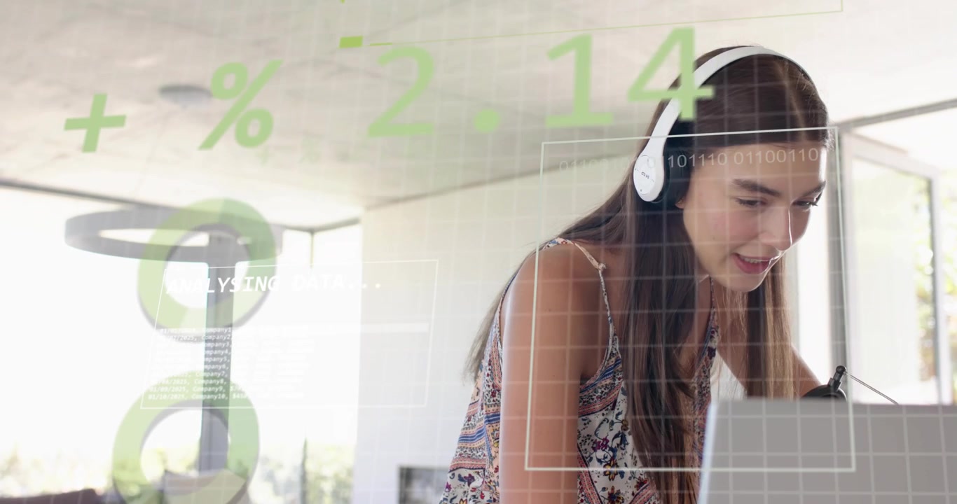 Female analyst typing on laptop analyzing data with transparent overlay showing percentage, binary