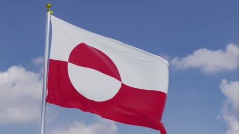 Flag-Of-Greenland-Moving-In-The-Wind-With-A-Clear-Blue-Sky-In-The-Background,-Clouds-Slowly-Moving,-Flagpole,-Slow-Motion