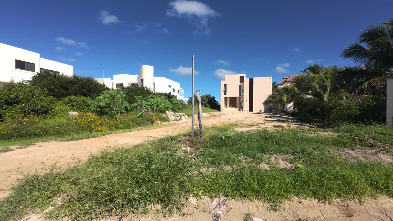 Sisal Travel and Coastal Development. Dynamic video sequence showcasing the vibrant lifestyle and real estate growth in Sisal, Yucatán