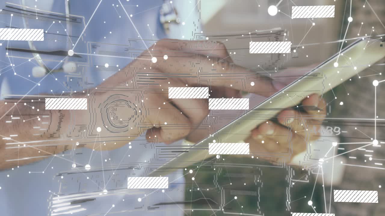 Man hovering finger over tablet activating nodes, tapping and swiping while organizing data blocks