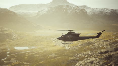 slow-motion-Vietnam-War-era-helicopter-in-mountains