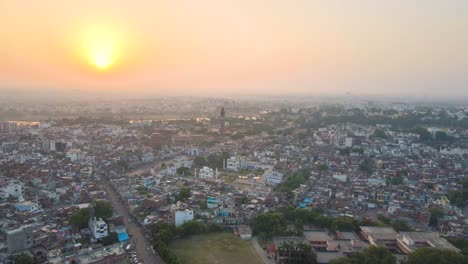 drone shot of lucknow city, capturing the grandeur of jama masjid and chota imambada at sunset.