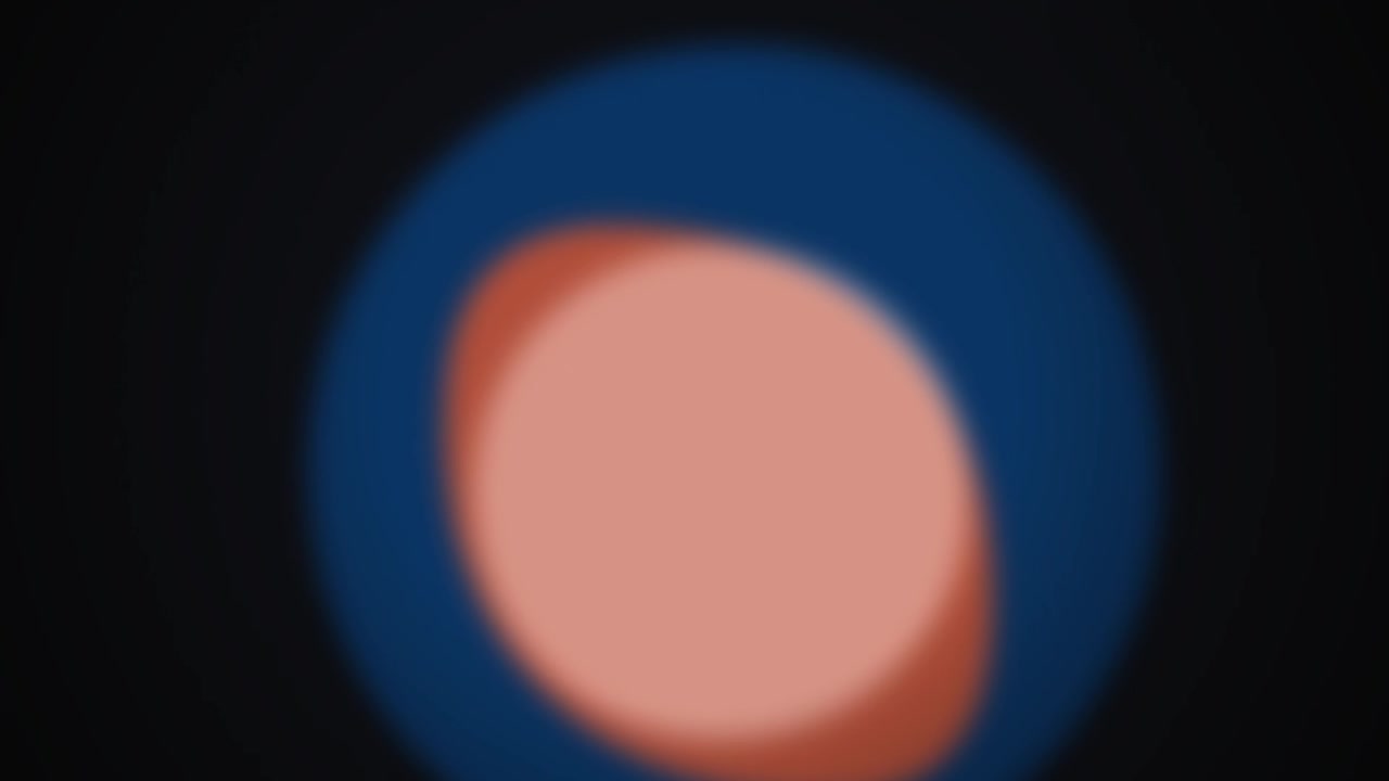 Abstract Motion Graphic of Blurring Orange and Blue Circles