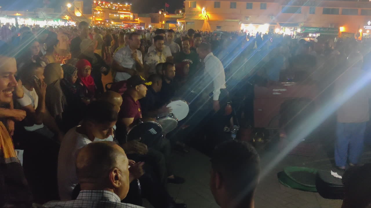 Live music performance at Jamaa el Fna square at night, Marrakesh's Medina Quarter. Marrakesh