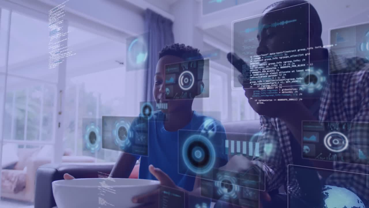 Animation of digital screens over smiling african american father with son watching tv