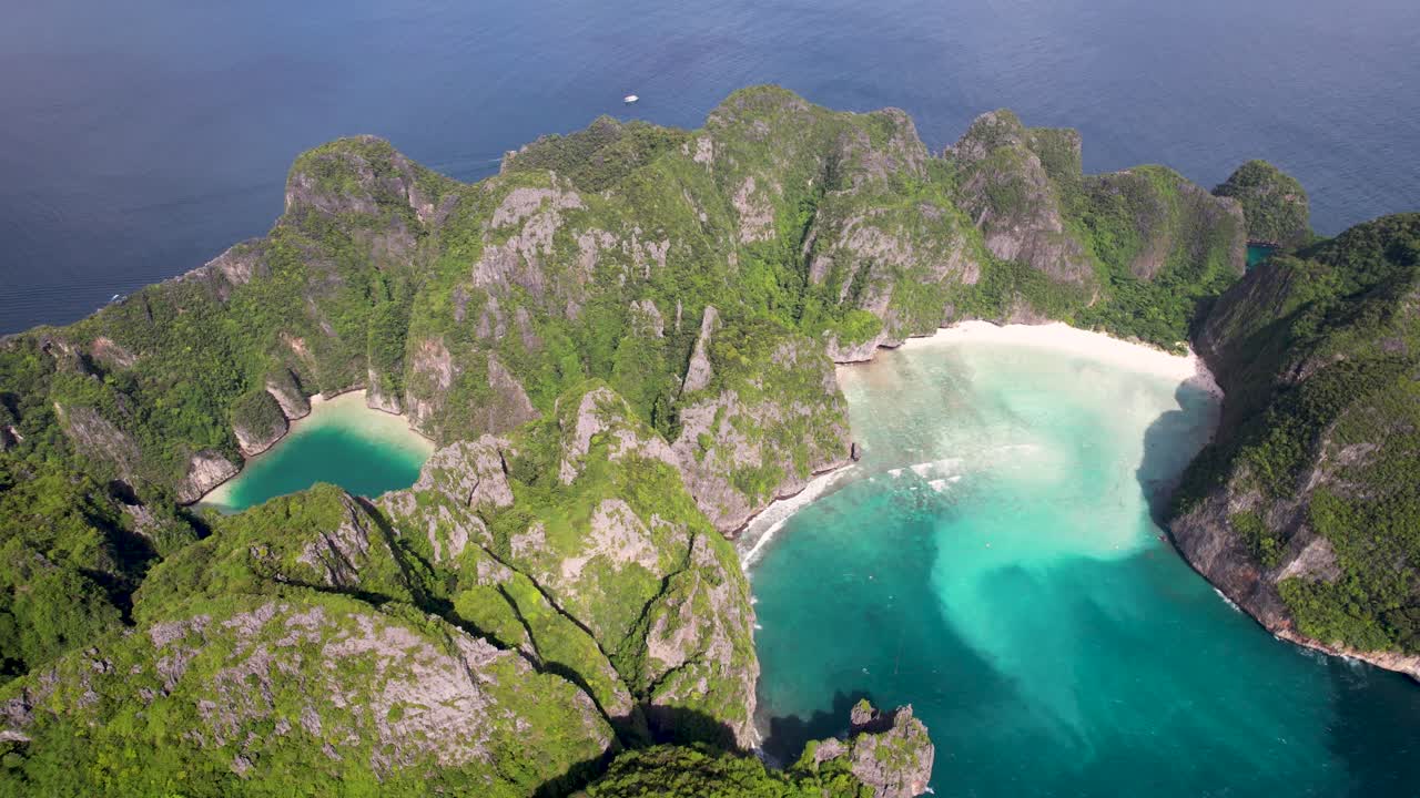Aerial top-down drone view of Phi Phi Leh, Pileh Lagoon, Krabi province, Thailand. Amazing tropical island with turquoise water and white beach, famous travel destination, clear turquoise water.