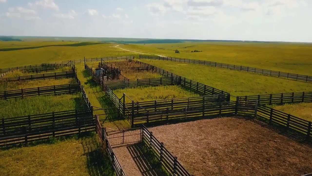 Aerial drone shot of the Bazaar Cattle Pens in the Flint Hills, Kansas. Rising shot.