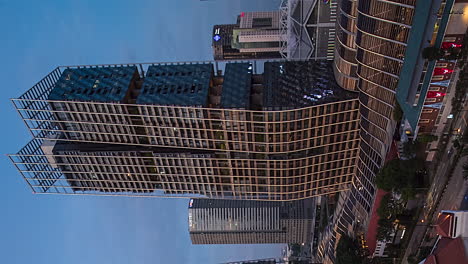singapore city skyline and south beach road downtown core area - vertical time lapse