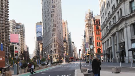 Animation-of-new-york-street-with-pedestrians-and-road-traffic-on-sunny-day