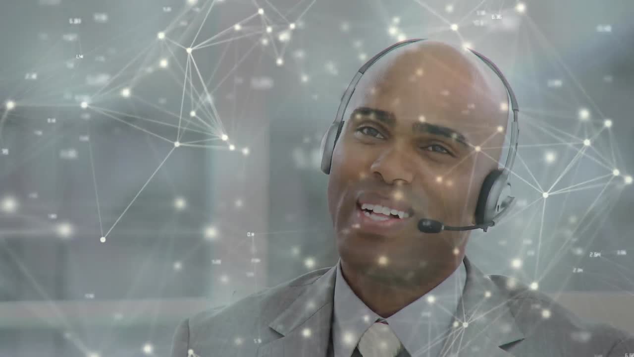 Animation of network of connections over businessman with headset in office