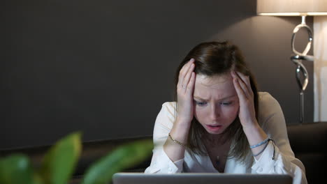 a young professional business woman receiving bad news