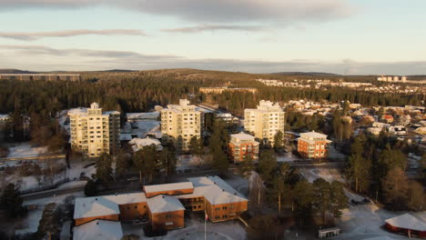 white rooftops and snowy driveways in the quiet city of sundsvall in sweden -aerial shot