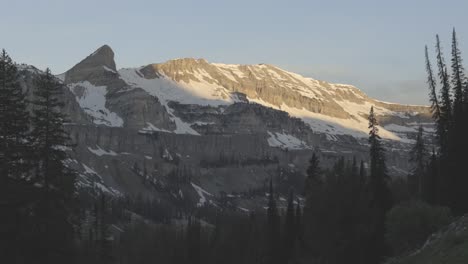 handheld shot of mountains in the early summer