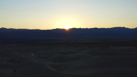 spectacular view of sand dunes in death valley in the evening