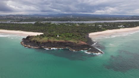 fingal head lighthouse and seascape in new south wales, australia - aerial shot