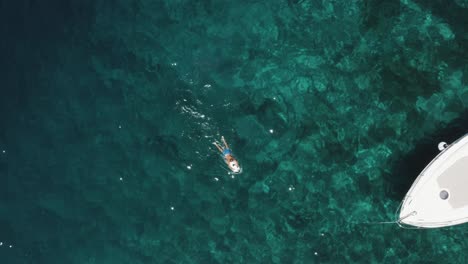 An-aerial-drone-shot-of-someone-using-a-seascooter
